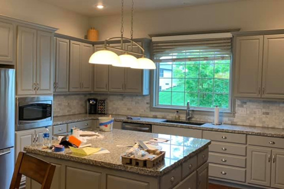 home kitchen with island in the center