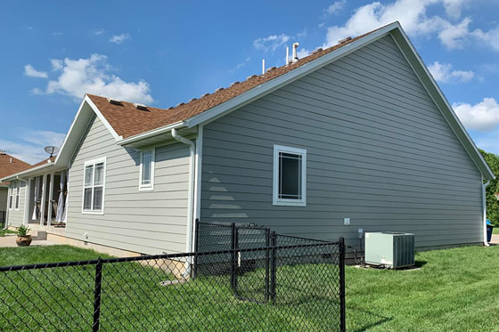 exterior of a house with a black fence